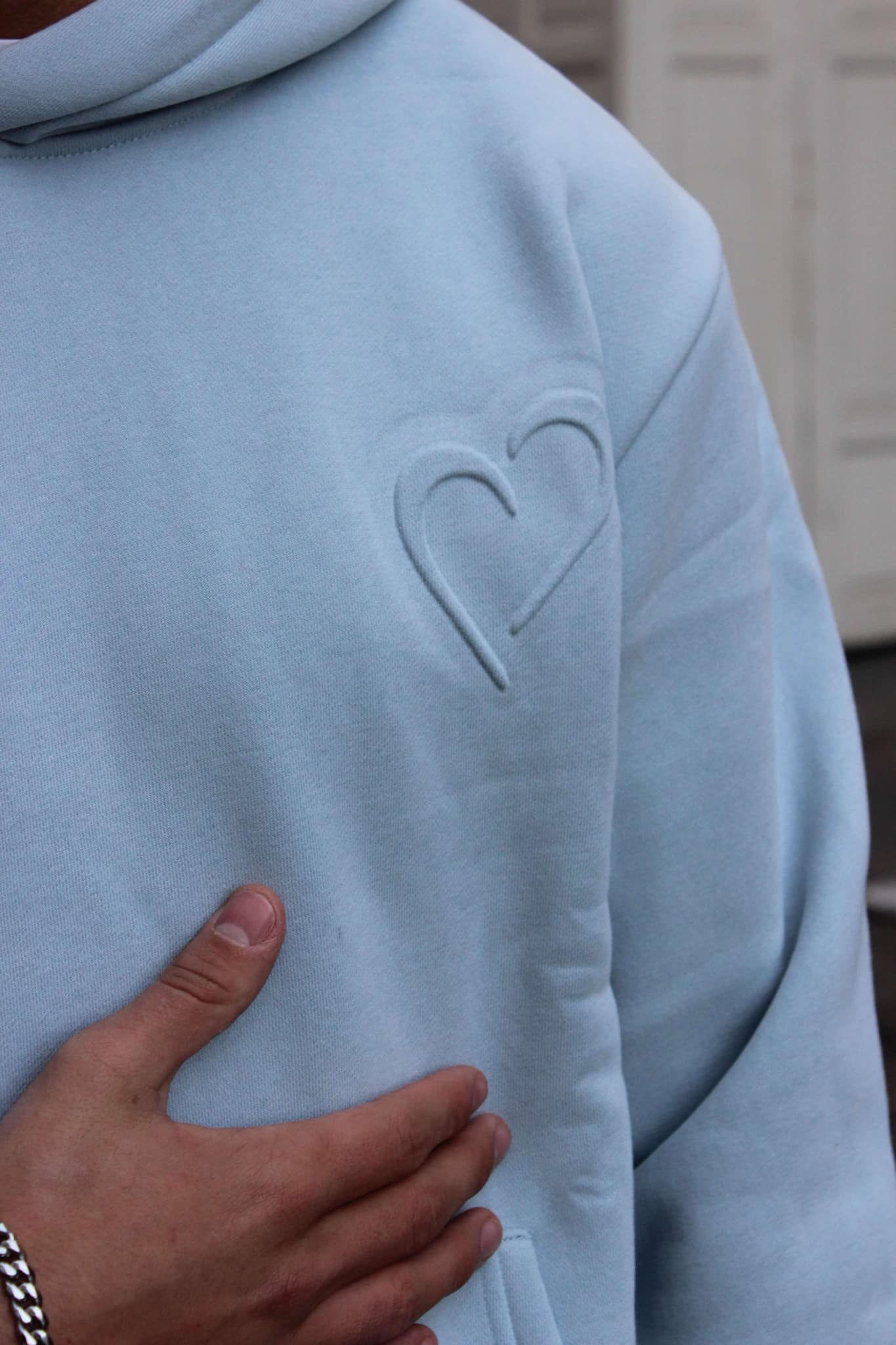 Hoodie with Embossed Print